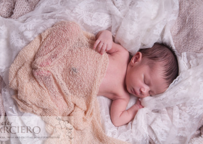 Newborn baby photos baby on white material