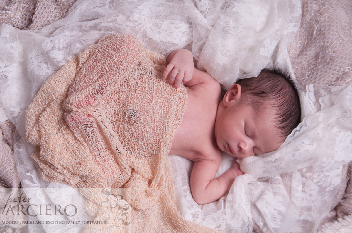 Newborn baby photos baby on white material